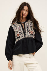 Blusa ampia ricamata