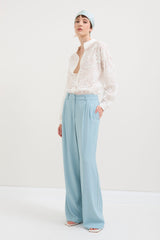 PANTALONI AMPI CON PIPING