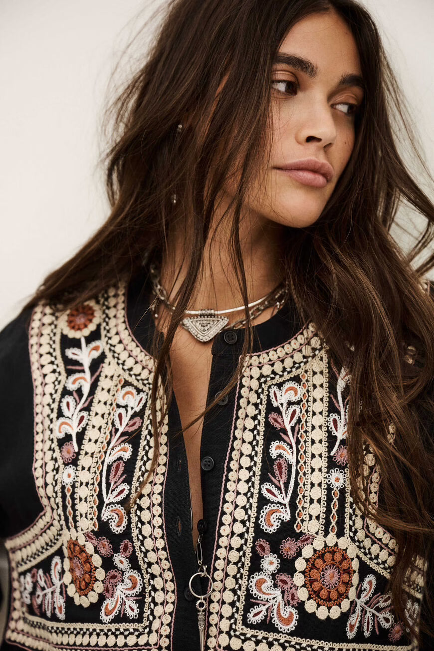 Blusa ampia ricamata