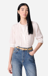 Blusa in cotone con ricami di pizzo