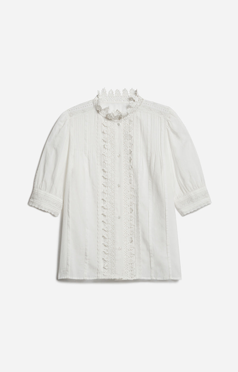 Blusa in cotone con ricami di pizzo