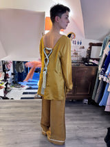 Blusa in seta con intreccio sul dietro