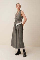 Gonna pieghe in tela di lana con riporti in tessuto