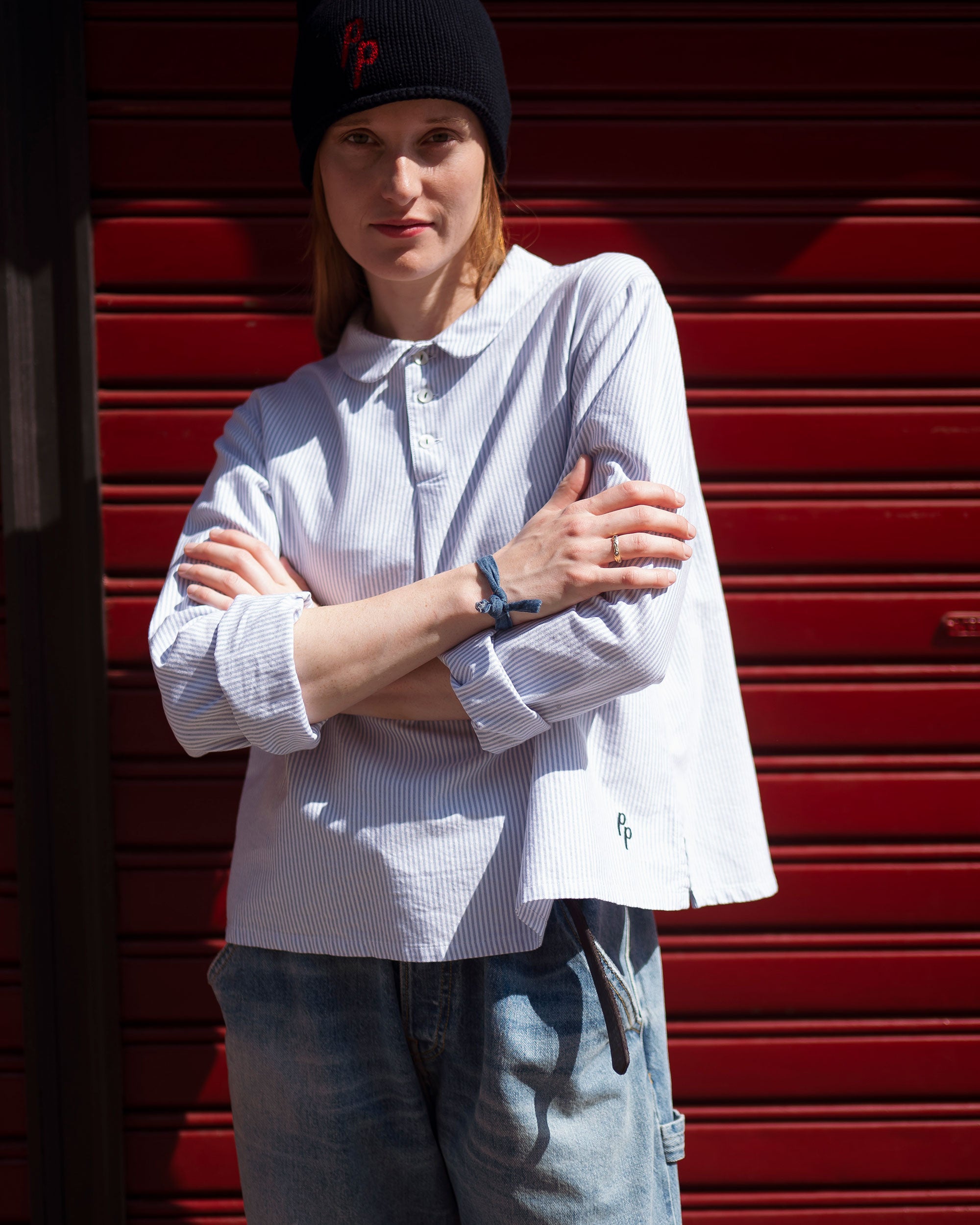 Blusa in cotone a righe con colletto stondato