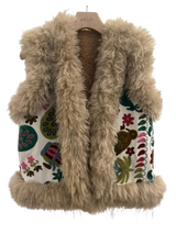 Smanicato in eco fur Phiili