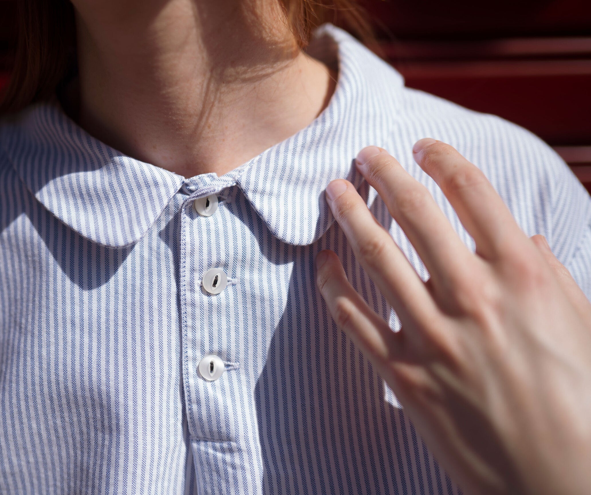 Blusa in cotone a righe con colletto stondato