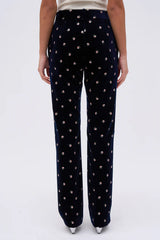 Pantaloni in velluto con stampa floreale