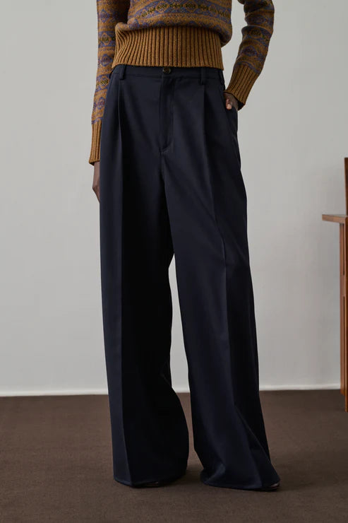Pantaloni con piega in gabardine di lana