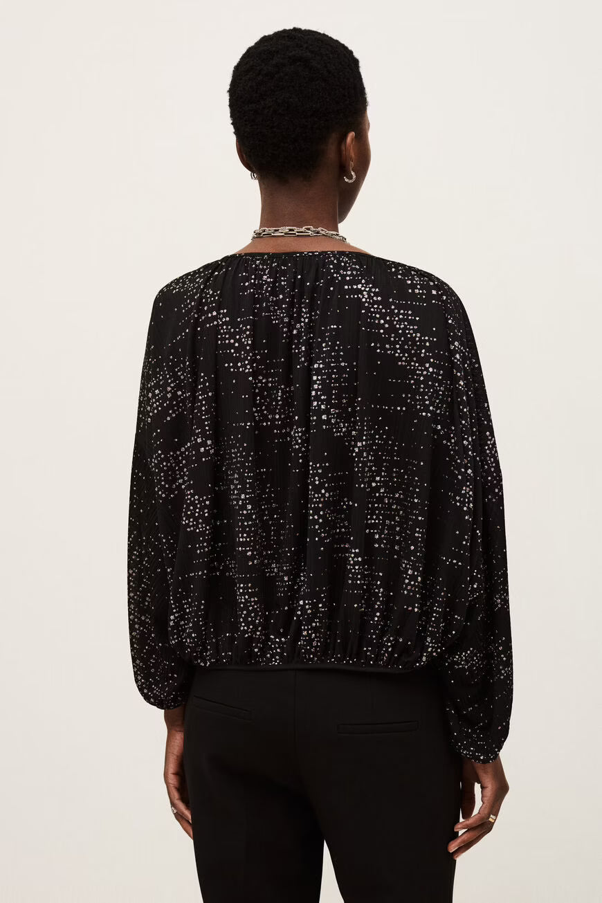 Blusa con brillantini