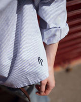 Blusa in cotone a righe con colletto stondato