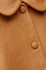 Giacca corta in pelle con colletto