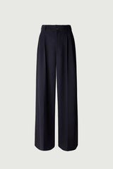 Pantaloni con piega in gabardine di lana