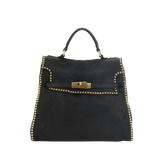 Monospalla "GINEVRA" in pelle di vacchetta tinta in capo con borchie