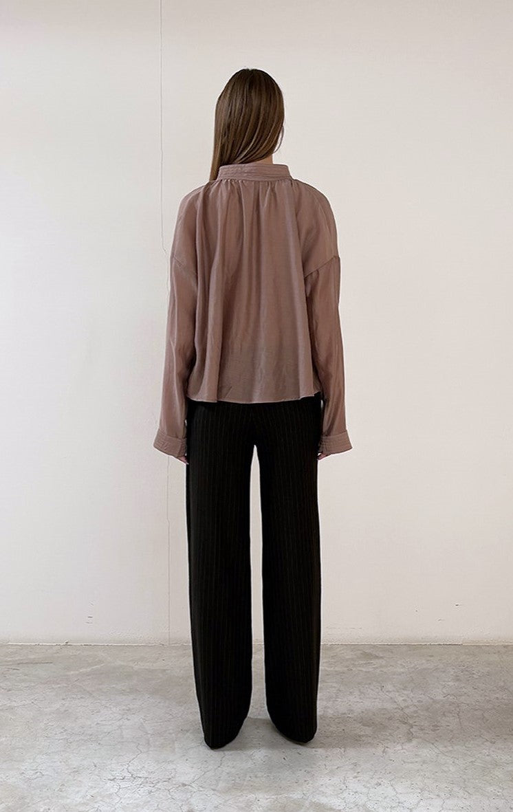 Blousa fluida semitrasparente