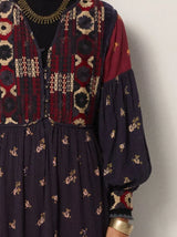 Abito lungo con corpetto in velluto