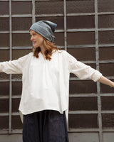 Blusa Port con dettagli a pieghe