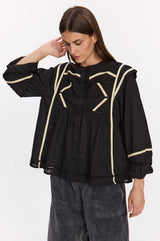 Camicia con bordi a contrasto